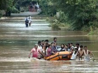 Helicopters, boats pressed into service in flooded Assam