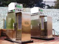 2 e-toilets in, 100 more by year-end