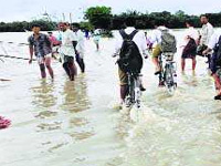 Assam flood scene still grim, life disrupted in Dibrugarh